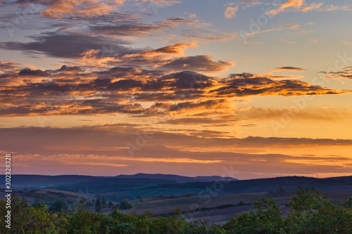 Morning colorful sky over landscape © Pavel Rezac