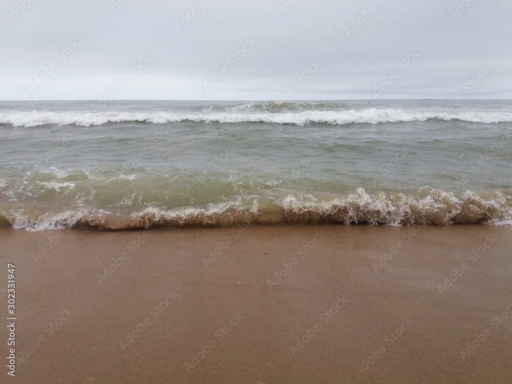 Wave breaking on the beach.