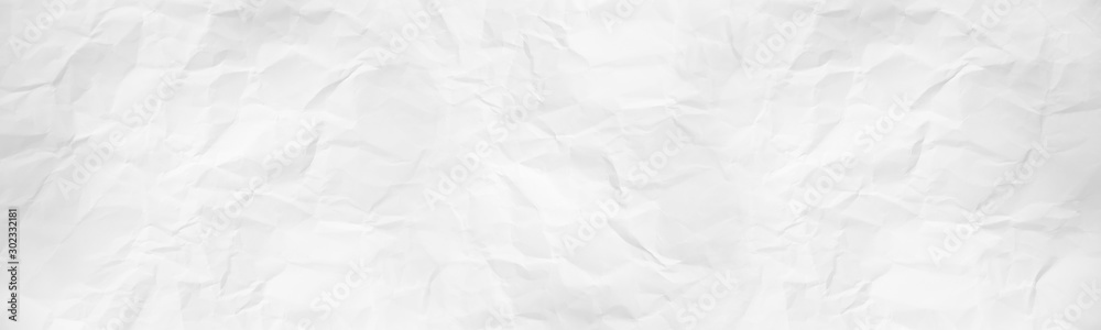 wide panorama crumpled paper texture background. crush paper so that it becomes creased and wrinkled. wide panorama crumpled paper texture background. crush paper so that it becomes creased and wrinkled.