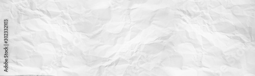 wide panorama crumpled paper texture background. crush paper so that it becomes creased and wrinkled.