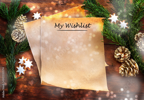 Φωτογραφία Paper sheet with text My Wishlist between fir branches, cinnamon stars and Chris