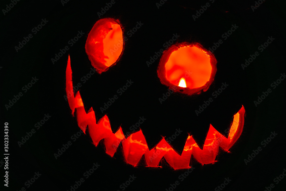 Fototapeta premium Carving the pumpkin is always the best part of Halloween.