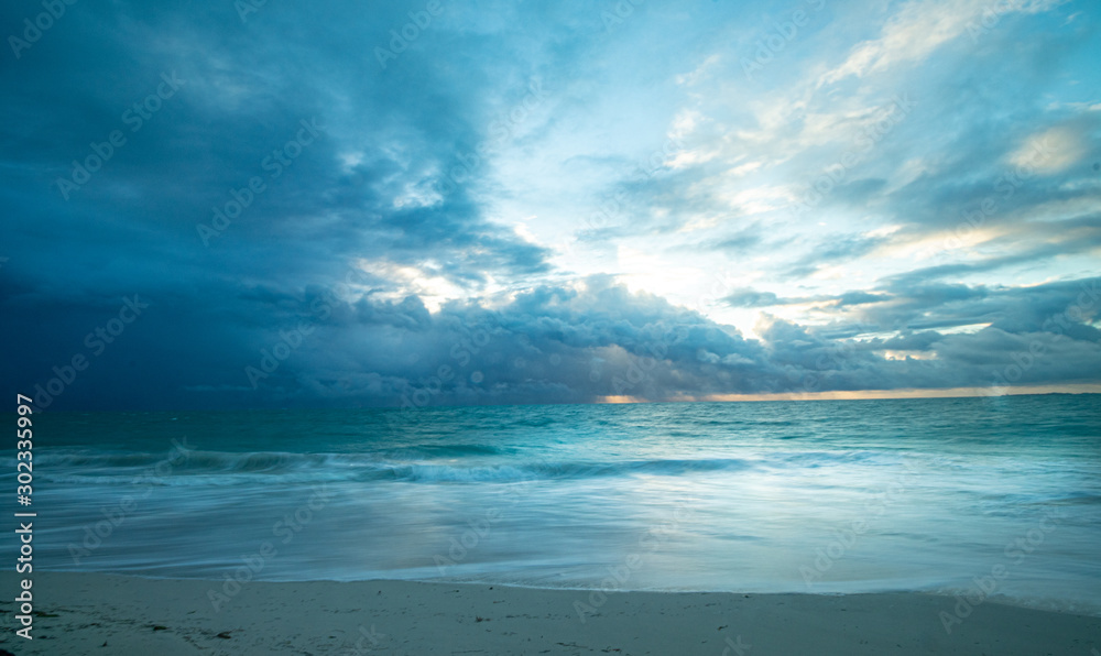 Storm coming at sunrise Isla Blanca Cancún Mexico