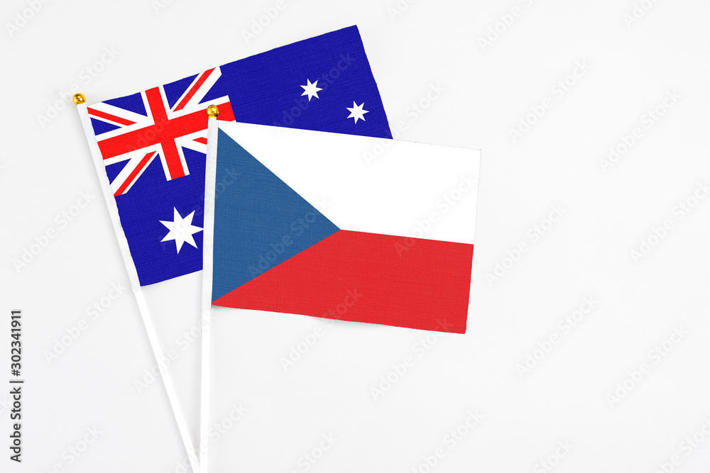 Czech Republic and Australia stick flags on white background. High quality fabric, miniature national flag. Peaceful global concept.White floor for copy space. Czech Republic and Australia stick flags on white background. High quality fabric, miniature national flag. Peaceful global concept.White floor for copy space.