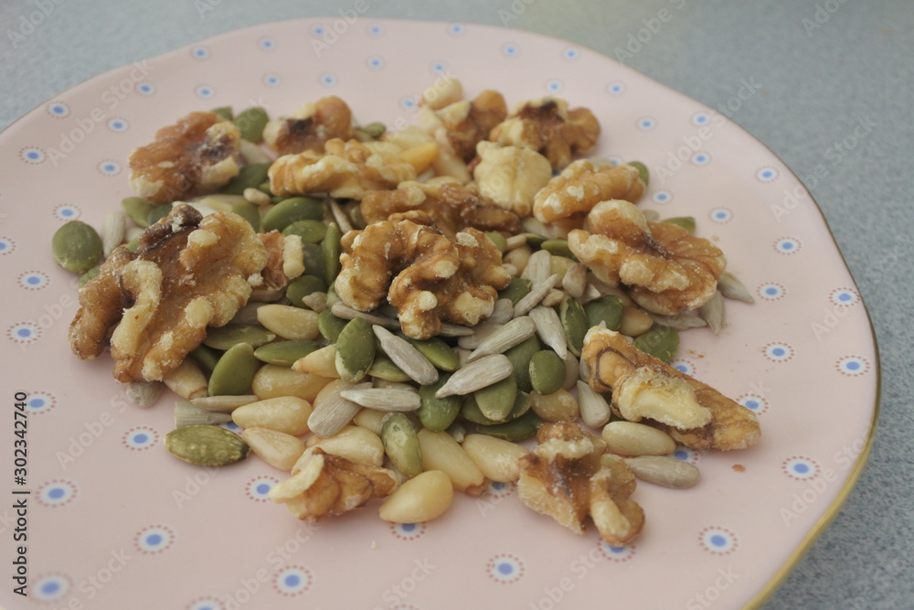 Plate full of edible seeds and nuts