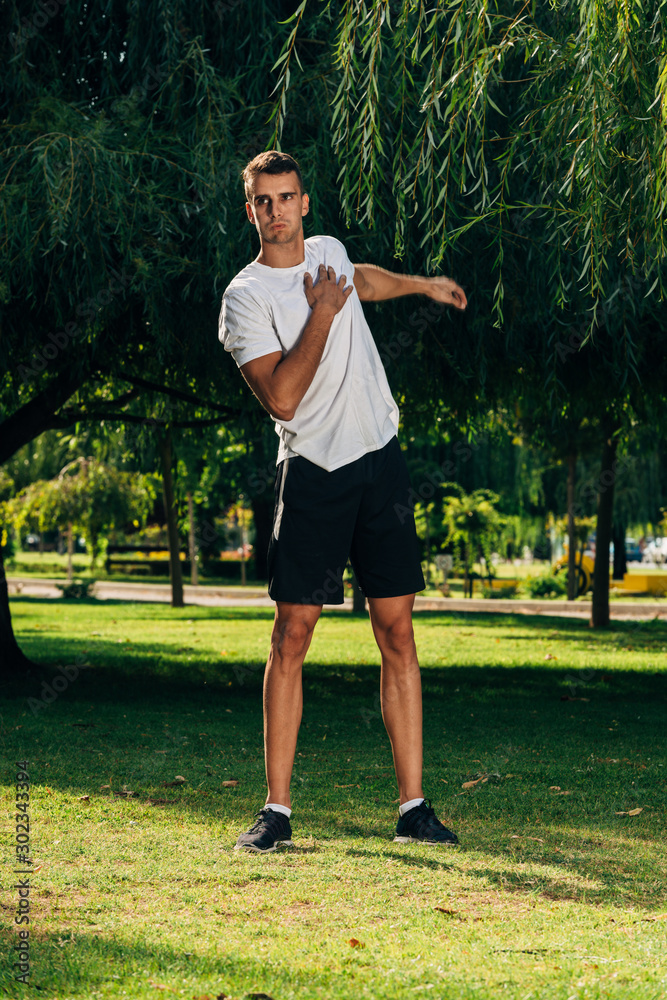 Stretching exercise - sport crossfit man outdoor Stretching exercise - sport crossfit man outdoor