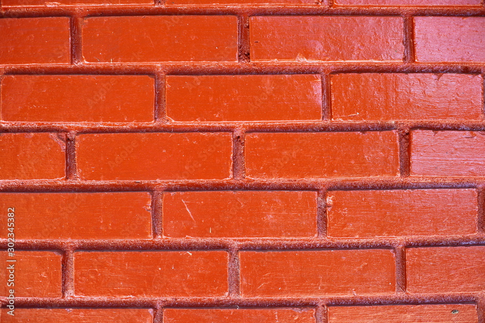 Obraz premium Brick wall painted with orange