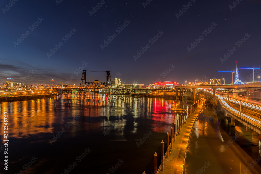 Portland Oregon and the Steel Bridge over the Willamette River at night
