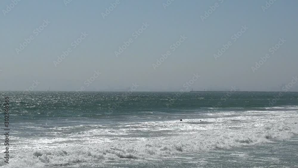 Beautiful ocean view of waves breaking on the shore at Sunset Beach California Beautiful ocean view of waves breaking on the shore at Sunset Beach California