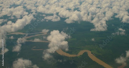 Flying Over Impassable Jungles of Borneo Island near Mulu River in Gunung Mulu National Park, Sarawak Province, Malaysia