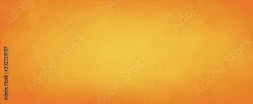 Yellow orange background with faint texture and distressed vintage grunge and...