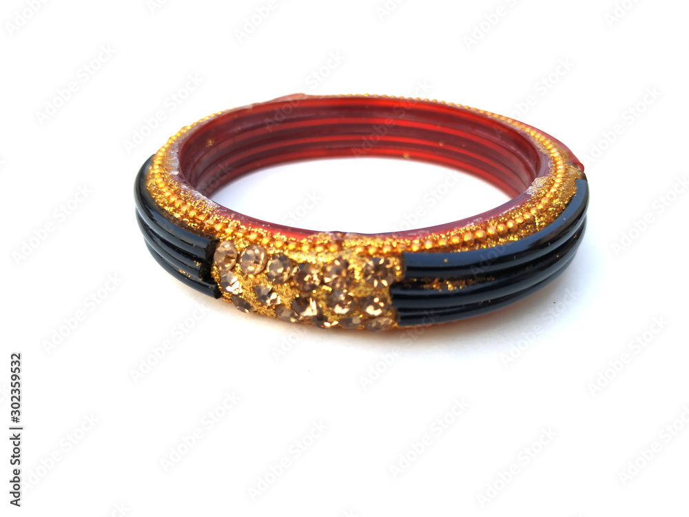 indian traditional bangles isolated on violet background indian traditional bangles isolated on violet background