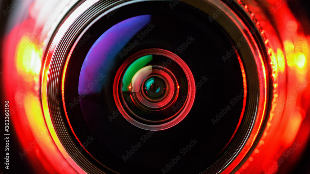 The camera lens and the beautiful light red color. Horizontal photo Stock  Photo | Adobe Stock