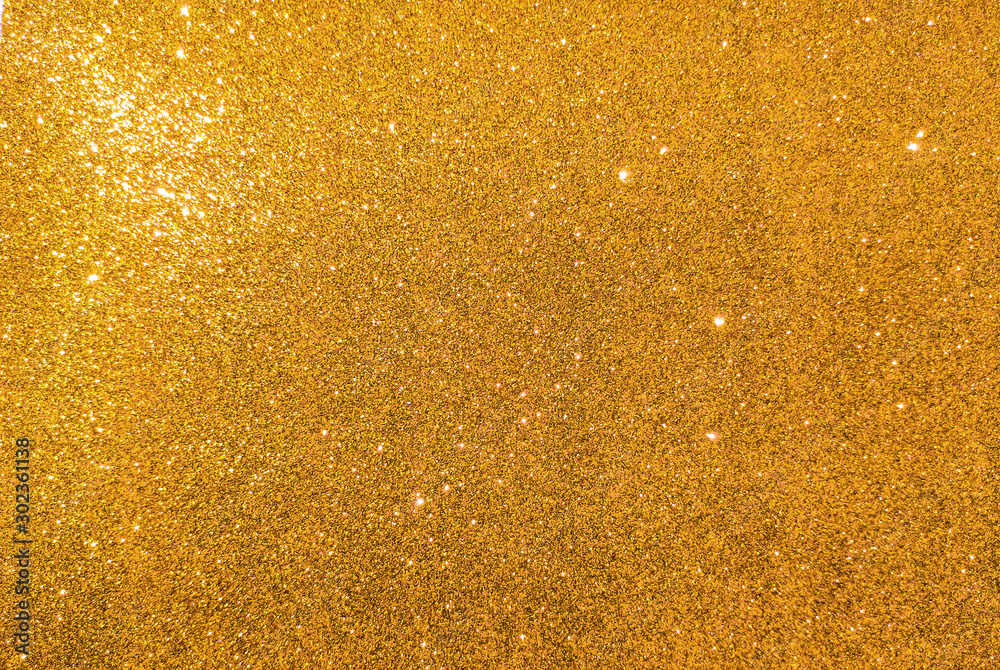 Golden shiny glitter texture background surface
