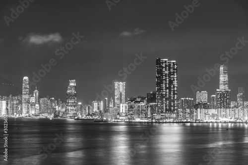 Panorama of Skyline of Victoria Harbor of Hong Kong city at night © leeyiutung