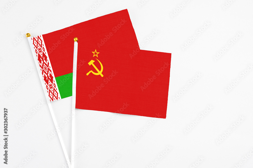 Soviet Union and Belarus stick flags on white background. High quality fabric, miniature national flag. Peaceful global concept.White floor for copy space. Soviet Union and Belarus stick flags on white background. High quality fabric, miniature national flag. Peaceful global concept.White floor for copy space.