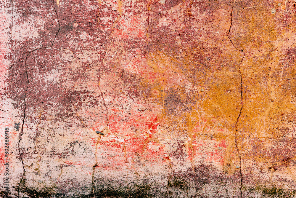 Texture of a concrete wall with cracks and scratches which can be used as a background Texture of a concrete wall with cracks and scratches which can be used as a background