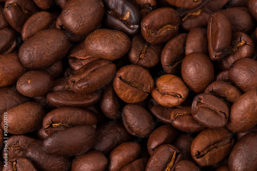 Naklejka premium roasted coffee beans, can be used as background