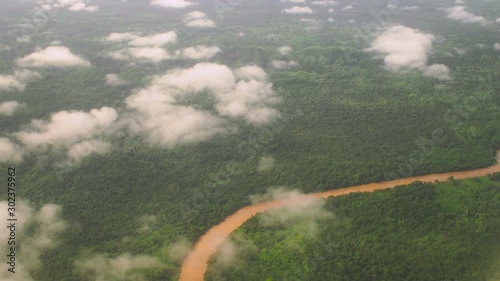 Flying Over Impassable Jungles of Borneo Island near Mulu River in Gunung Mulu National Park, Sarawak Province, Malaysia