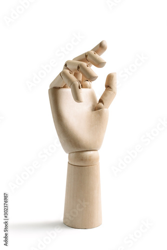 One wooden hand isolated on a white background with a soft relaxed position