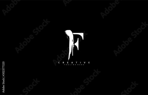 Grunge F logo urban monogram script