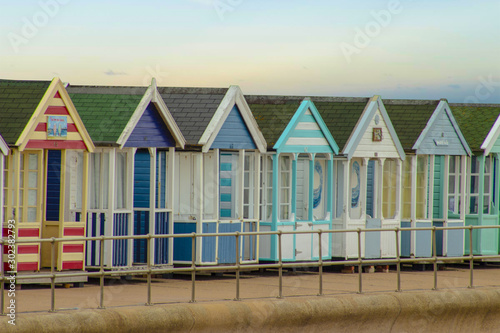 Colorful beach huts  sea coast cabins for summer holiday vacation  Southwold UK