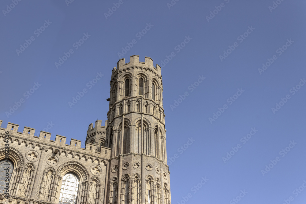 Tower of big, tall cathedral, romanesque and gothic style architecture church, duomo in Ely England 