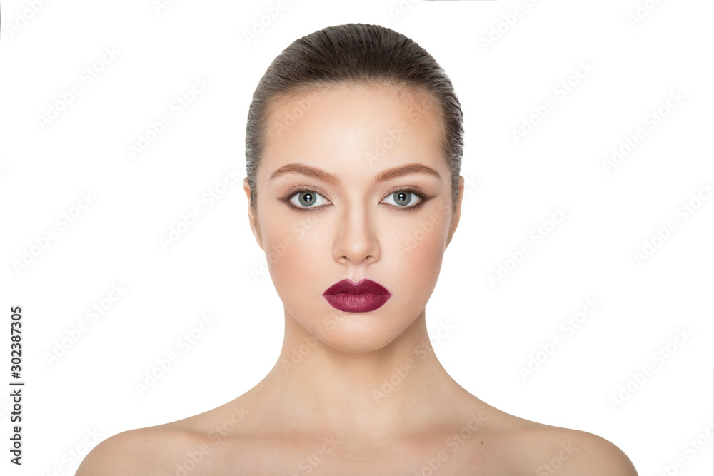 Model Girl with Perfect Fresh Skin. Brunette female looking at camera, with makeup, lips. over white background. Model Girl with Perfect Fresh Skin. Brunette female looking at camera, with makeup, lips. over white background.
