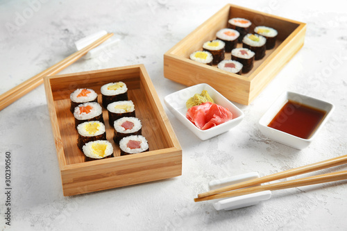 Tasty sushi on light table