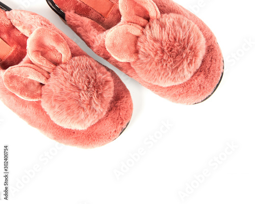 Cute warm fluffy women's Bunny Slippers isolated on white background