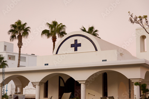 Agios Georgios Chapel in Ayia Napa resort town in evening light photo