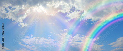 Fotografia, Obraz Beautiful vibrant double rainbow Cloudscape Background - awesome blue sky with p