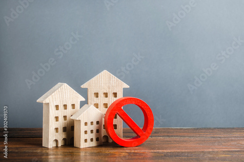 Quadro su tela Apartment buildings and red prohibition symbol NO