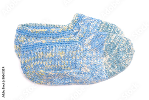 Woolen footsteps isolated on white background. Handmade knitwear.