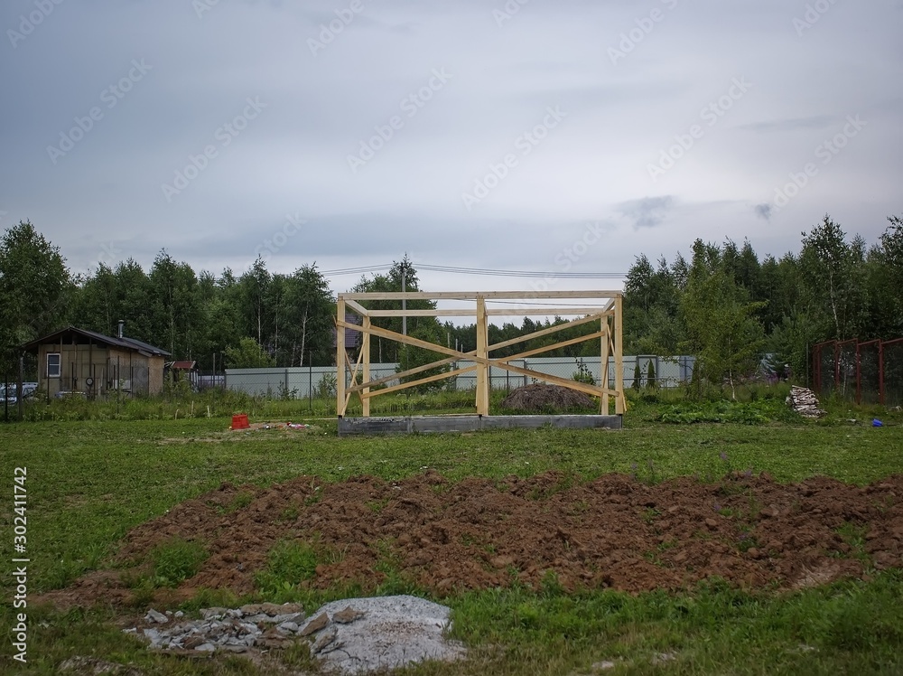 construction of a small house in summer, Russia.