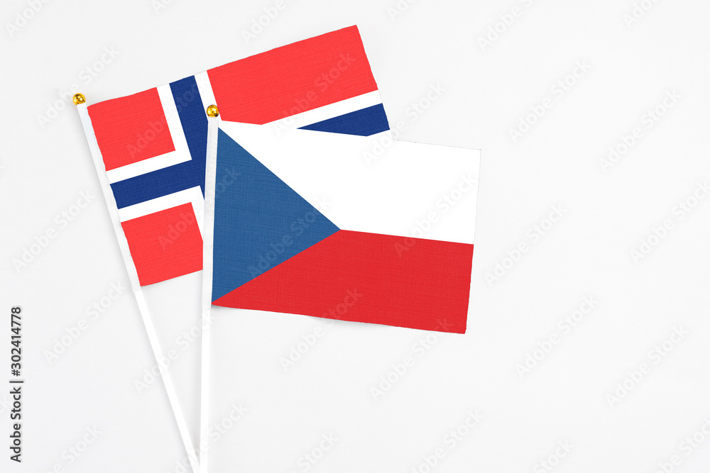 Czech Republic and Bouvet Islands stick flags on white background. High quality fabric, miniature national flag. Peaceful global concept.White floor for copy space. Czech Republic and Bouvet Islands stick flags on white background. High quality fabric, miniature national flag. Peaceful global concept.White floor for copy space.