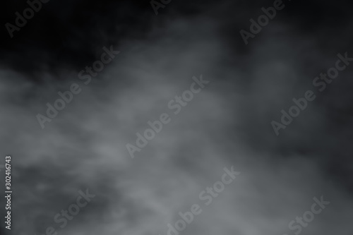 Smoke spray spread with wind on black background. Soft blur fog around