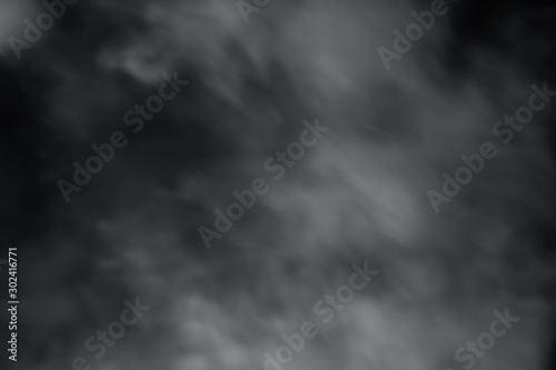 Smoke spray spread with wind on black background. Soft blur fog from right side