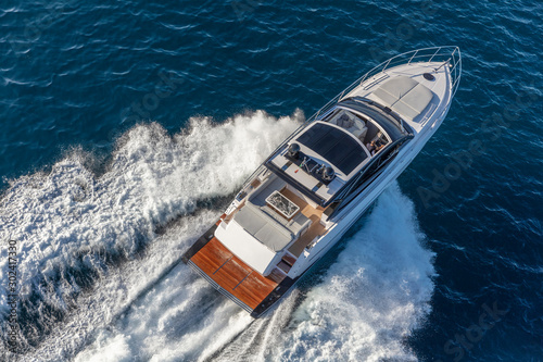 luxury motor yacht in navigation, aerial view © Andrea