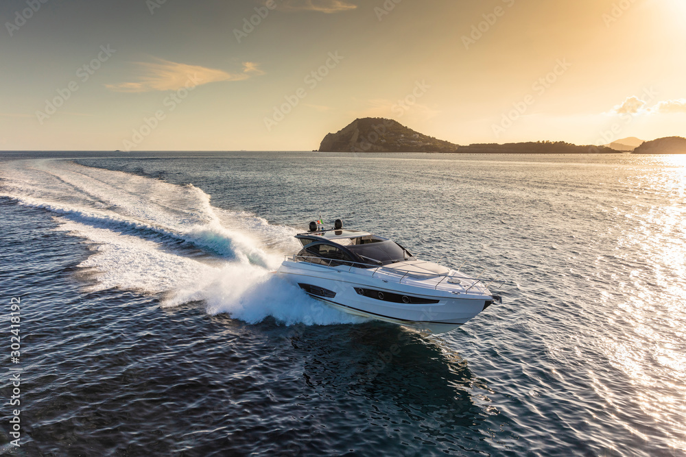 luxury motor yacht in navigation, aerial view - obrazy, fototapety, plakaty 
