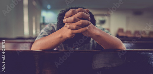 Fényképezés Close up prayer's hand pray in church, Pastor pray to God, with blank copy space