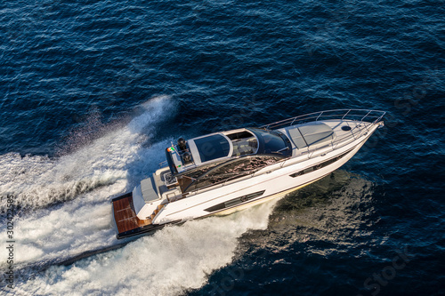 luxury motor yacht in navigation, aerial view © Andrea