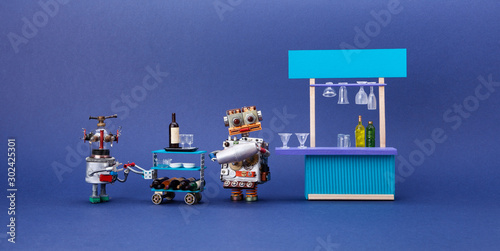 Funny restaurant staff characters  bar counter service area. Barman holding cocktail shaker  waiter with a trolley and wine. Two funny professional robots await guests. Blue background