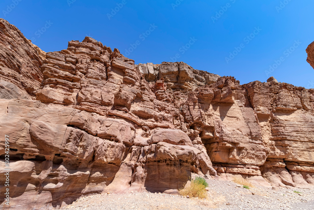 Spectacular surfaces of the stone mountains in the Red Slot Canyon. Travel Israel