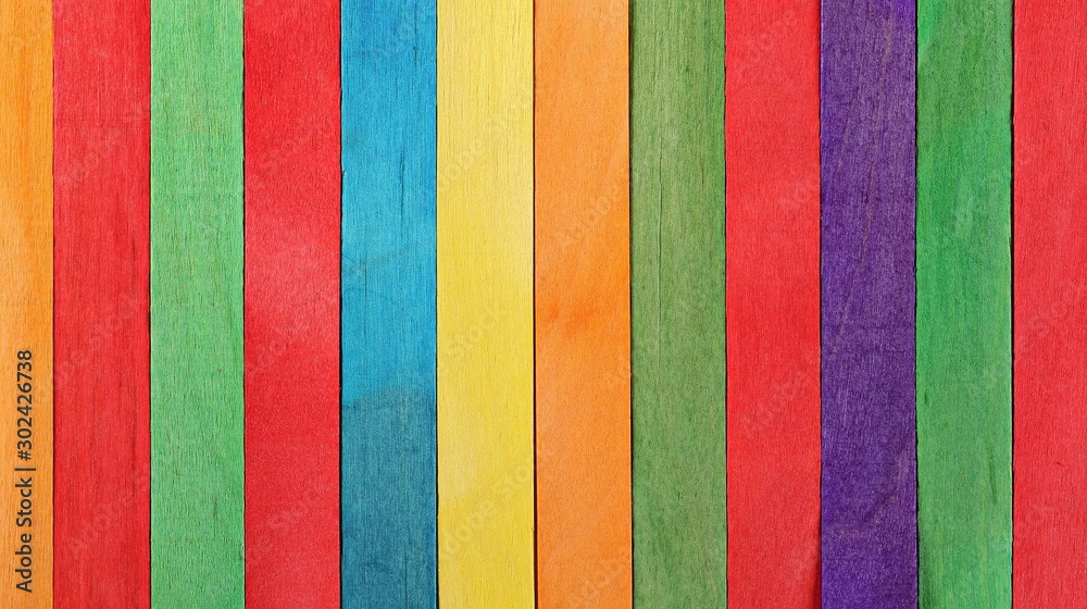Colorful medical throat inspection wooden spatulas, plywood planks isolated on white background Colorful medical throat inspection wooden spatulas, plywood planks isolated on white background