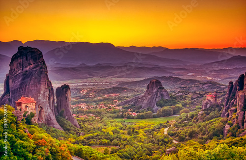 Landscape with monasteries and rock formations in Meteora, Greece. during sunset.