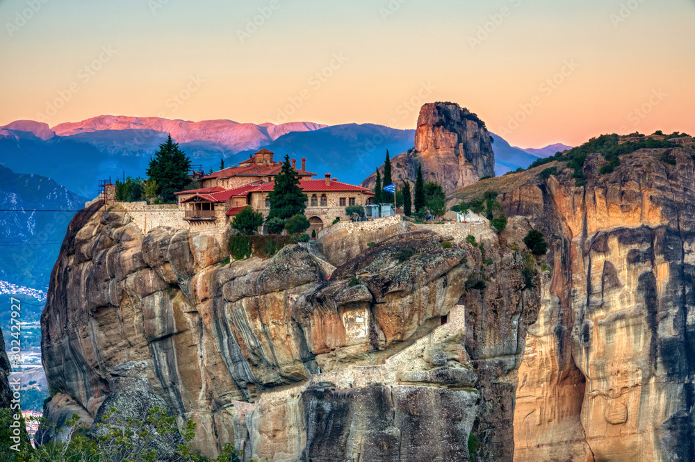 Landscape with monasteries and rock formations in Meteora, Greece. during the sunrise