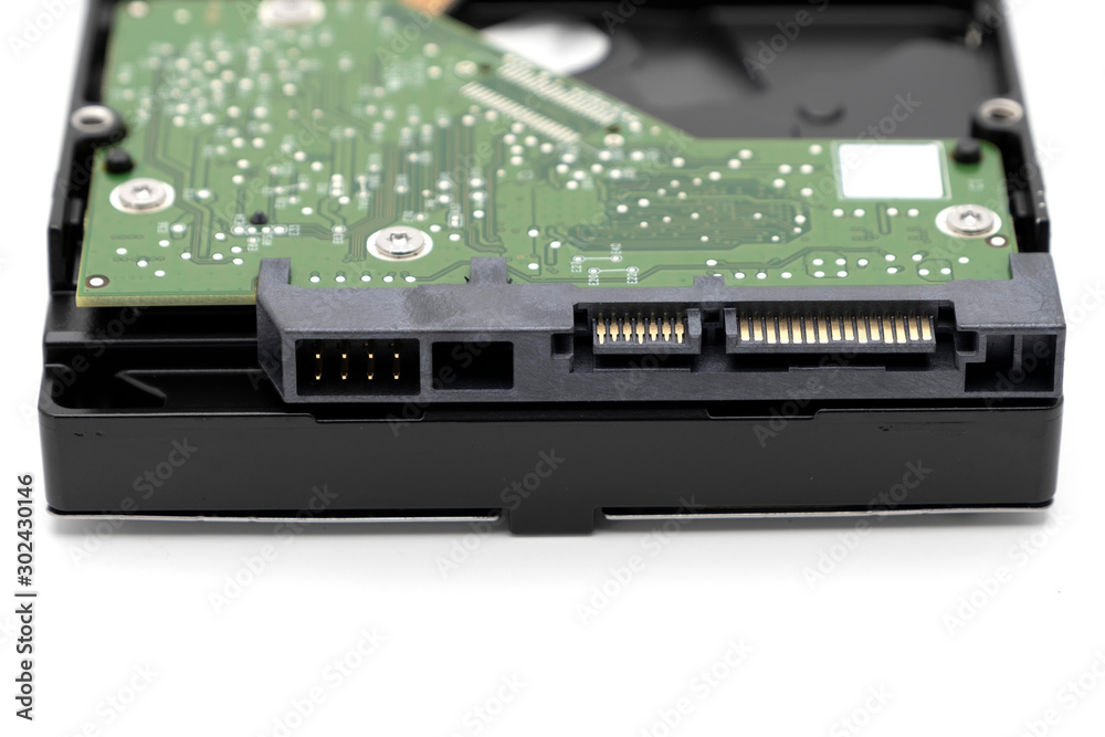 Fototapeta premium Old HDD or hard disk drive antique storage circuit board and connection port isolated on white background