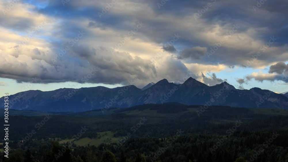 Strong wind and clouds flying over Tatras seen from Lapszanka the Slovakian border. Strong wind and clouds flying over Tatras seen from Lapszanka the Slovakian border.