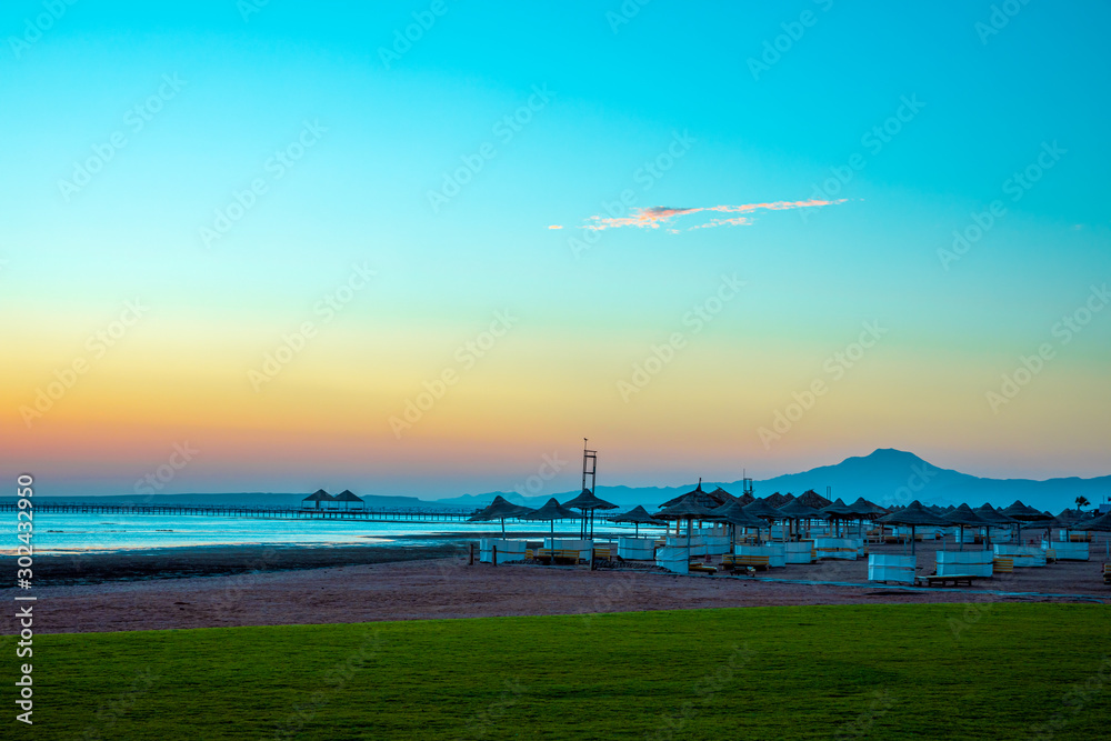 Fototapeta premium Beautiful sunset on the beach by the Red Sea, Sharm El Sheikh, Egypt.